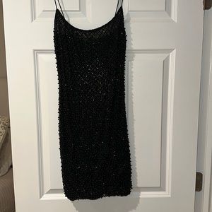 Black pearl studded dress